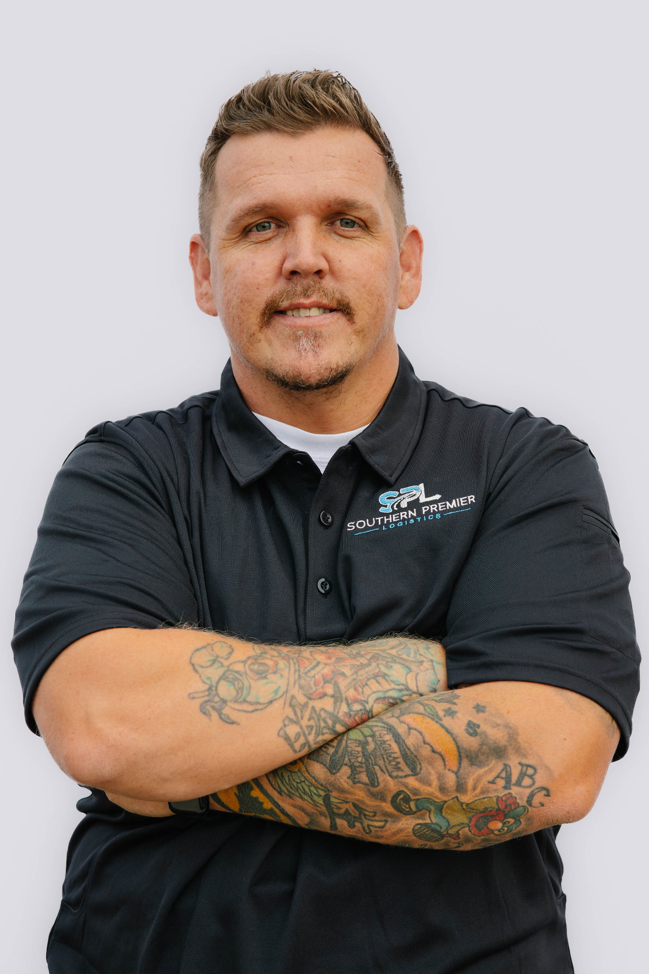 Almir Ponjevic, Professional Driver at Southern Premier Logistics, wearing a company polo