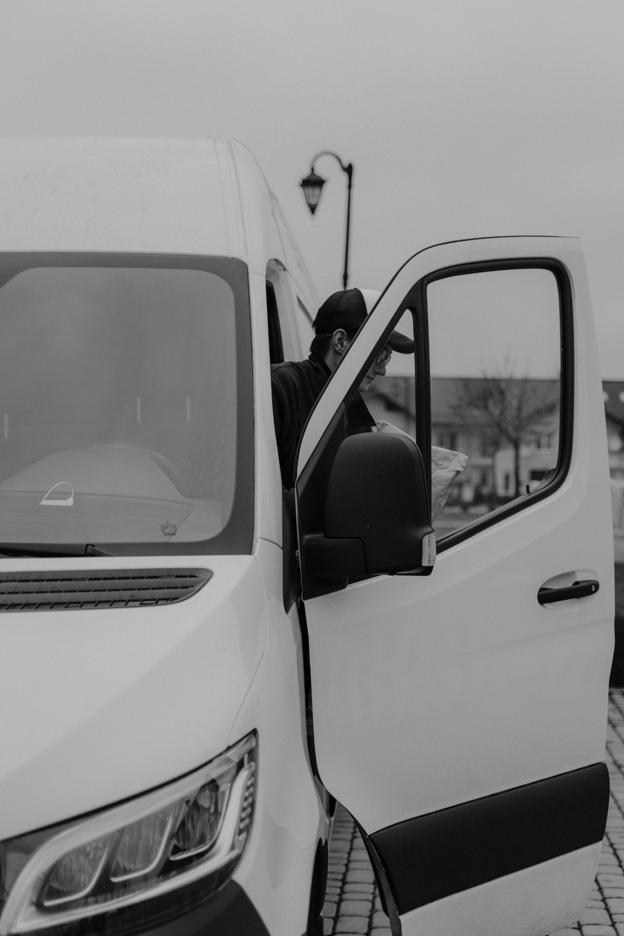 Cargo van and driver preparing for an interstate freight run